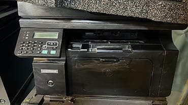 HP LaserJet M1212nf MFP printer.petleleri qirigdi ve adf islemir