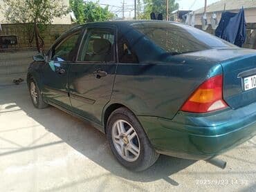 kia ceed 2010: Ford Focus sedan (mk1) – yaşıl rəngli, 4 qapılı. Texniki və daxili — 5