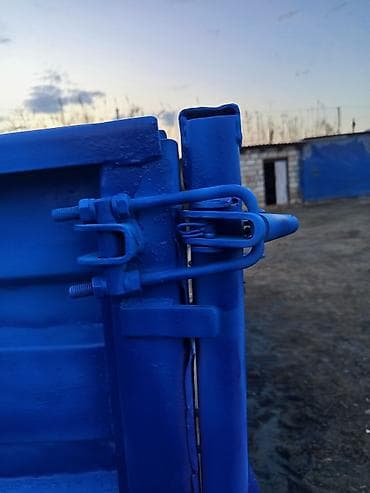 traktor 82 satisi az: Traktor qoşqusu – 2 oxlu, yanları açılan metal bortlu yük platforması — 9