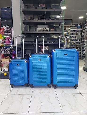 Çamadanlar: Məhsul: 3’lük sərnişin çamadan dəsti Təsvir: - Rəng: Parlaq mavi - — 1