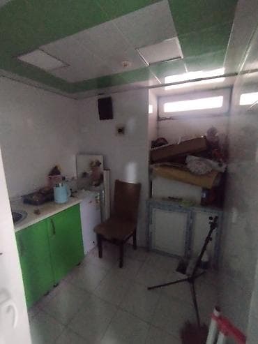 Daşınmaz əmlak: Əhmədli qəsəbəsi Qaçaq Nəbi küçəsi 1 ünvanında yerləşən 5 mərtəbəli — 8