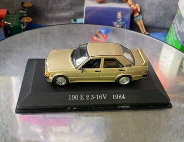 metbex tavan modelleri: Коллекционная модель Mercedes-Benz 190E 2.3 16V W201 gold 1984 EDICOLA — 11