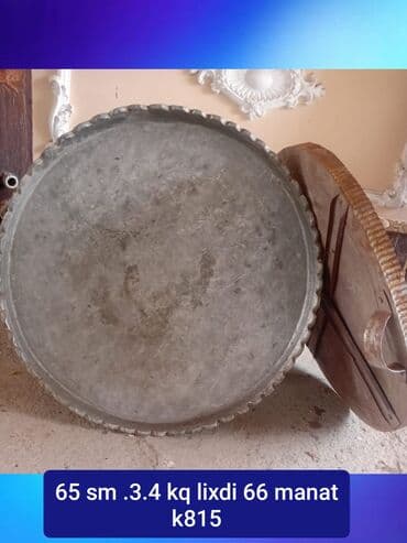 Digər mətbəx aksesuarları: • Məhsul: Dəyirmi metal sini/tepsi • Çap: 65 sm • Çəkisi: 3.4 kq — 1