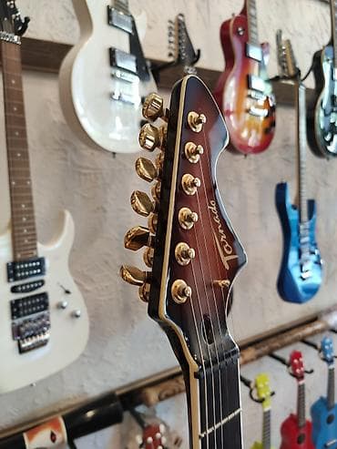 elektro gitarlar: Elektro gitara
Tornado
Çanta və kabel hədiyyə — 3