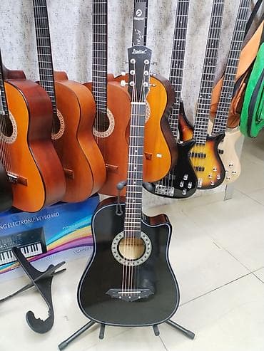 akustik gitara: Akustik gitara Rast musiqi alətləri Mağazasınin unvanlari; 1) Əhmədli — 1