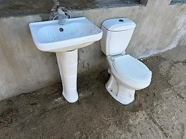 Sanitar qarnitur – unitaz və əl-üz yuyan lavabodan ibarət dəst Ikisi