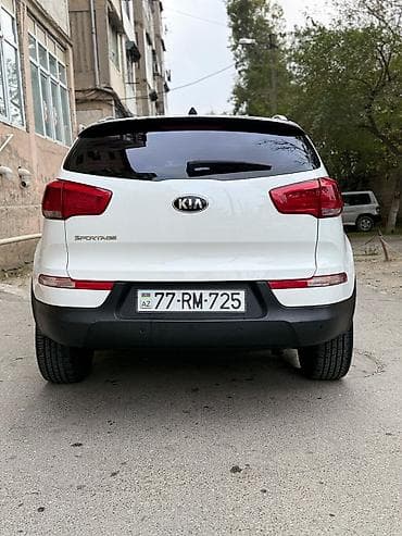 tesla disk: Kia Sportage, ağ rəng, kompakt krossover. Güclü və qənaətcil — 2