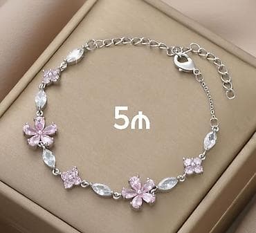 staınless steel saat: Məhsulların təsviri: - Cütlər üçün üzük dəsti – 2 ədəd. Gümüşü və — 3