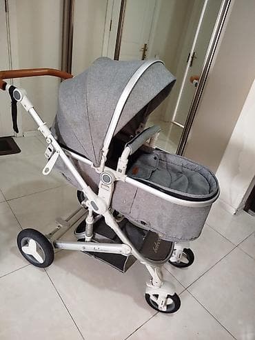 uşaq araba: IrKolyaska satilir Qiymet 55 man Az ishlenib Unvan:Ehmedli 9677 A — 1