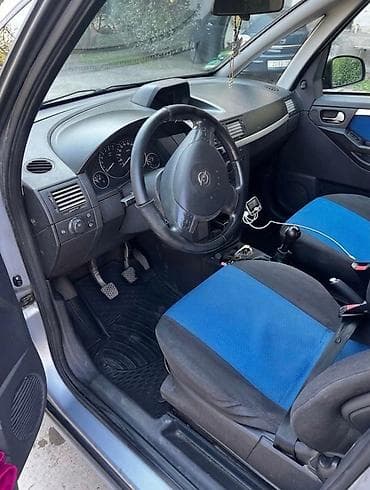 fort az: Opel Meriva, gümüşü rəng, kompakt miniven. Texniki və komplektasiya — 6