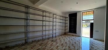 - Obyekt: Yol kənarında yerləşən ticarət-təchizat təyinatlı bina — 10
