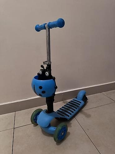 Мопеды, скутеры: Uşaq skuterı – 3 təkərli, mavi rəng Xüsusiyyətlər: - Ön hissədə 2 — 5