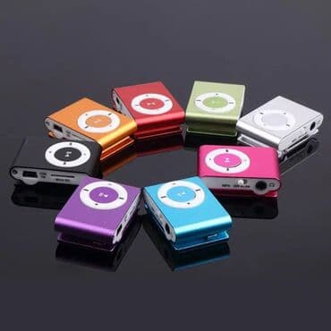mp3 yukle pulsuz: Mini MP3 pleyer – klipsli, çoxrəngli. Xüsusiyyətlər: - MicroSD/TF — 7