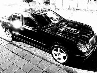 on panel: Mercedes-Benz E-Class sedan - Korpus: qara rəng, 4 qapı, xrom — 1