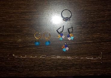 mini çanta: Paslanmaz metaldan rəngli qaşlarla üzük, sırğa, klon dəsti. Və ayrıca — 10