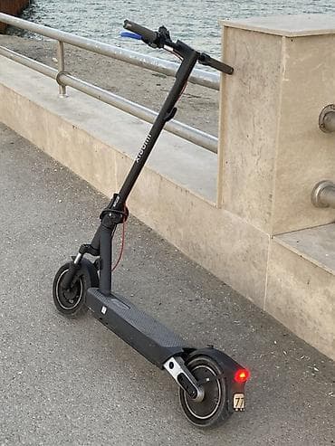 İşlənmiş Elektrik samokat 10", > 1000 Vt, 16 - 25 km/s, Ödənişli çatdırılma
