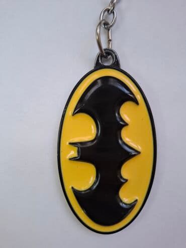 Qazanlar: Batman mövzulu açarlıq - Dizayn: Sarı fon üzərində qara, relyefli — 2