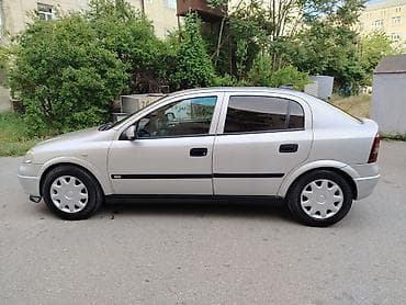 bmw e60 m: Opel Astra: 1.6 l | 1999 il Hetçbek — 2