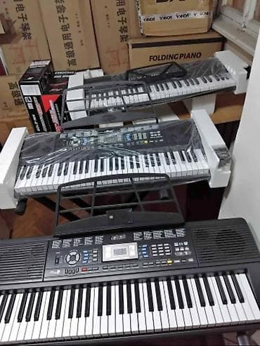 oyunca: Təzə. Qutuda 5 oktava 61 klaviş Pianino səslidir. Əlavə 255 cür — 2