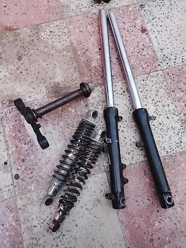 Motosiklet nnb arxa qabag amarizator ve travis çəngəl hissələri