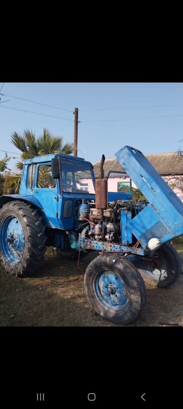 rengli işıq: Mavi rəngdə MTZ tipli təkərli traktor. Texniki xüsusiyyətlər və — 6