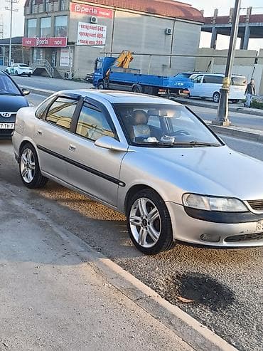 r16 disk teker: Opel üçün yüngül lehimli disk və şin dəsti - Marka/loqo: Opel mərkəz — 4