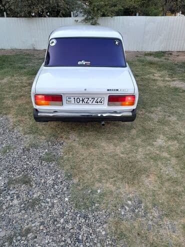 опель зафира а: Lada 2107 sedan – ağ rəng Xüsusiyyətlər: - Kuzov: 4 qapılı sedan, ağ — 15