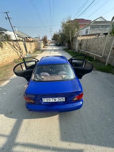 kia sou 2013: Hyundai Accent: 1.5 l | 1995 il Sedan — 4