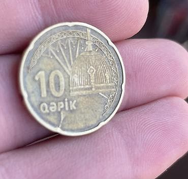 qepik pullar: Məhsul: Azərbaycan 10 qəpik brak sikkəsi Təsvir: - Nominal: 10 qəpik — 1
