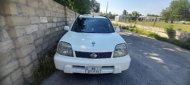 bmw e46 lip: Nissan X-Trail: 2 l | 2003 il Universal — 1