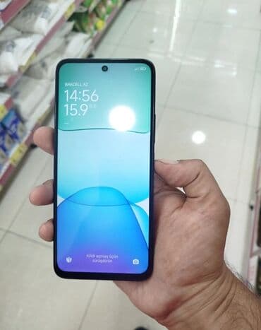 şirvanda islenmis telefonlar: Redmi Note 13, 256 GB, rəng - Qara, Barmaq izi — 5