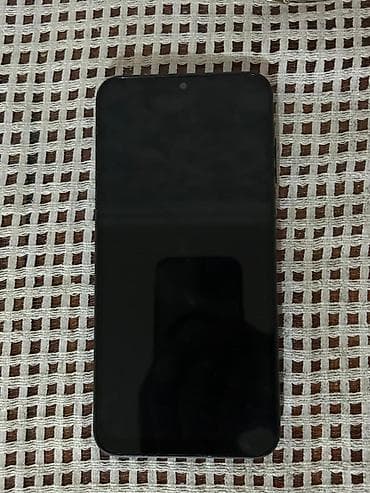 irşad electronics telefonlar: Mavi rəngdə smartfon - Arxa tərəfdə ayrı-ayrı yerləşdirilmiş 3 — 2