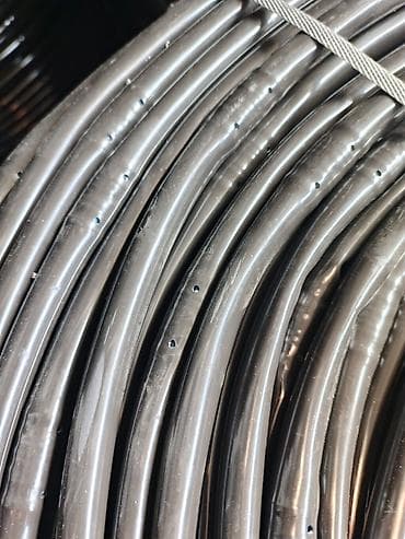 Damcı suvarma borusu – polietilen (PE) materialdan, tünd rəngli, hazır