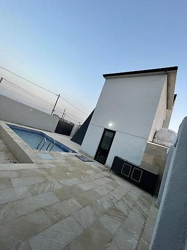 otaq: Ev sahibindən.Pirşağı dənizə yaxın yerləşən 2 mərtəbəli A-Frame günlük — 4