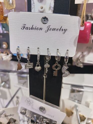 sebeke qizil sirqalar: Zərgərlik dəstləri – zövqlü aksesuar seçimi 1) Yaşıl daşlı çiçək — 7