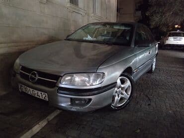 06 sekileri: Opel Omega: 2 l | 1994 il 200000 km Sedan — 2