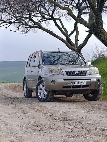 s150 satılır: Nissan X‑Trail (T30) – gümüş rəngli, 5 qapı, kompakt krossover/SUV — 2