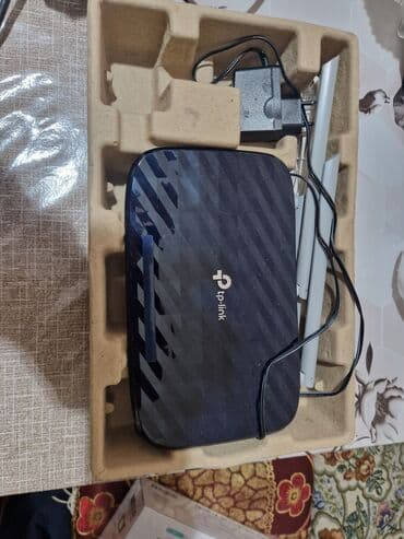modem baku: TP-Link Wi‑Fi marşrutizatorları dəsti Şəkillərdə iki fərqli TP-Link — 1