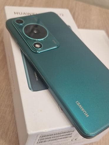 philips xenium 9@9s: Huawei — 1