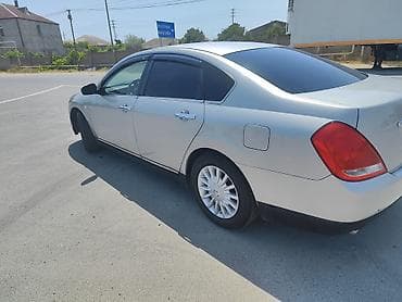 daewoo lanos 2011: Nissan Teana: 2.3 l | 2003 il Sedan — 6
