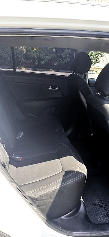 Kia Sportage: 2 л | 2013 г. Внедорожник — 9