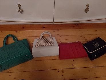 Qadin cantalari her biri 8manat cox istifade olunmuyub hecbir problemi