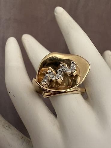 qızıl zinət əşyaları: 10 qr 750 prob üzük. 2000 AZN — 1