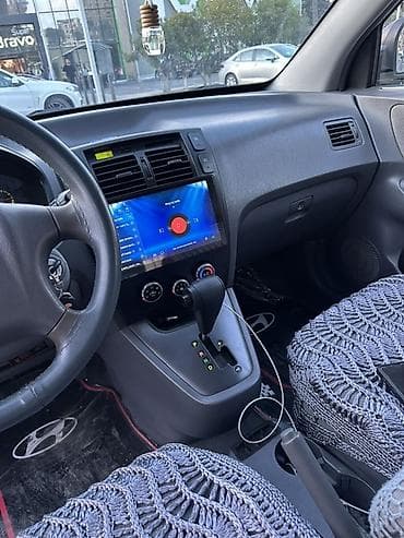 Hyundai Tucson: 2 л | 2005 г. Кроссовер — 5