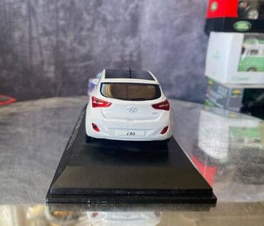 maşın modeli: Коллекционная модель Hyundai i30 5 door white 2012 Pino B&D Scale — 19