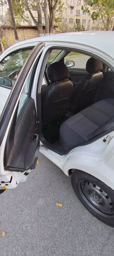 hyundai sonata 2011: Chevrolet Aveo: 1.2 l | 2011 il 420000 km Sedan — 8