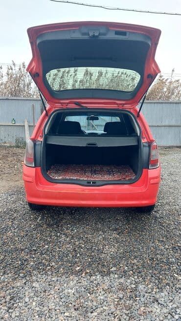 pobeda (maşın): Opel Astra: 1.3 l | 2009 il Universal — 6