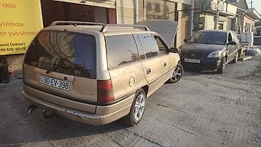 ceşka maşın: Opel Astra F Caravan (Universal) - Kuzov: universal (5 qapı), qızılı — 5