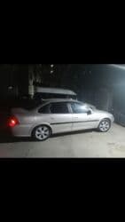 ferrari qiymeti: Opel Vectra: 1.8 l | 1998 il 337000 km Sedan — 5