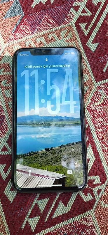 bakcell modem: IPhone 11, Qara, Face ID — 2